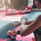 woman wrapping her hands at a boxing gym